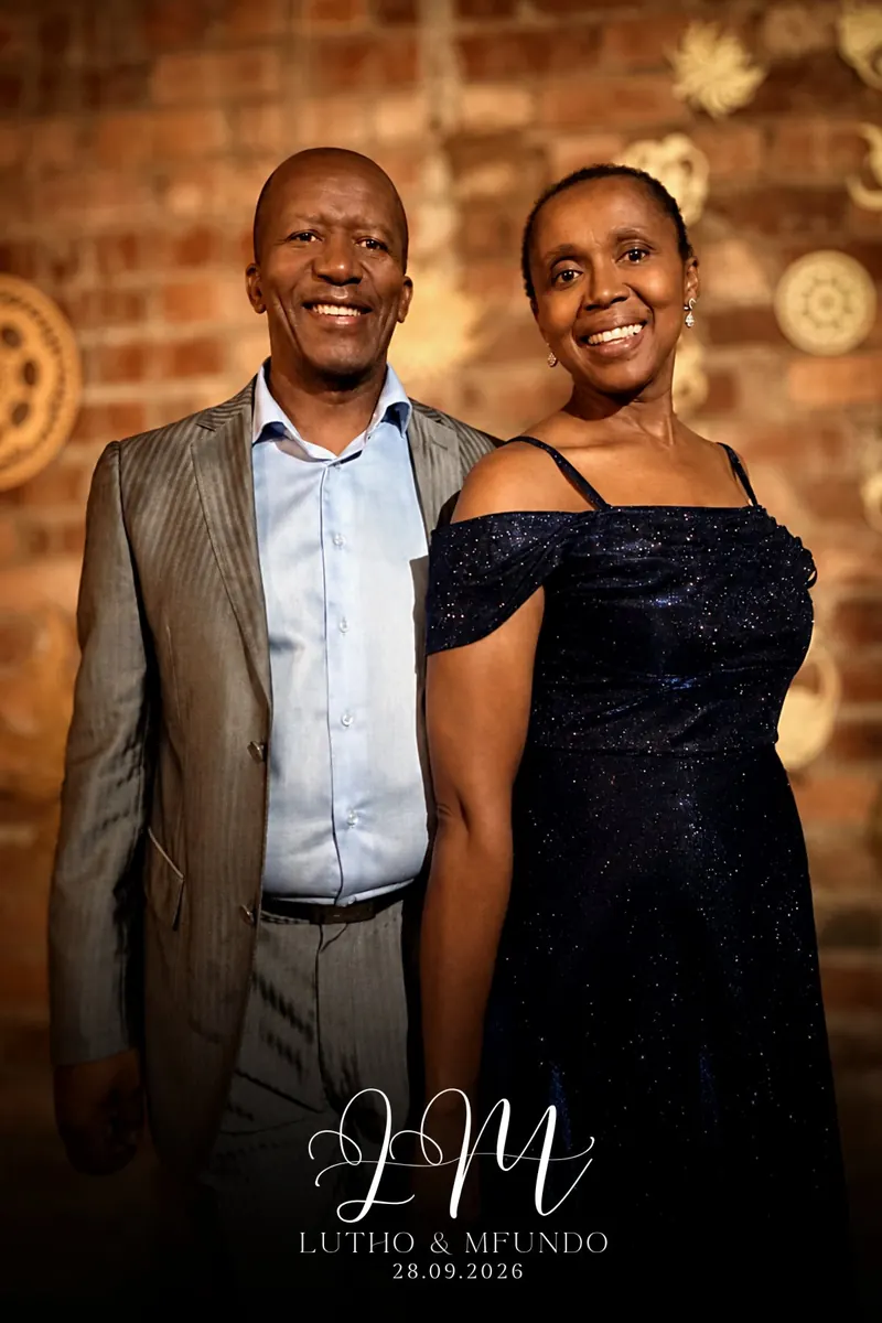 The same couple after the kiosk&rsquo;s warm AI edit with richer light and colour