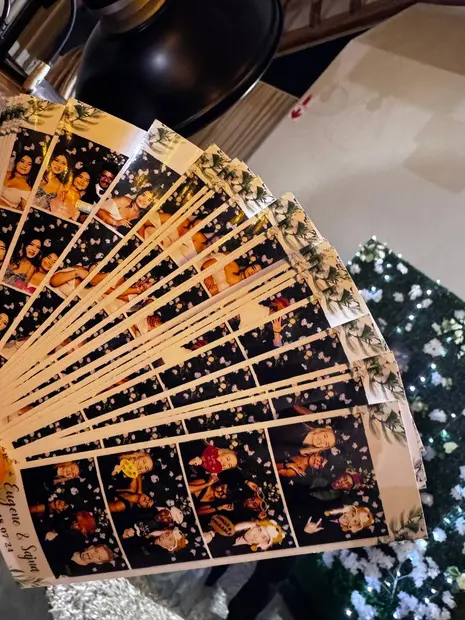 A fan of printed photostrips from a Brahman Hills wedding