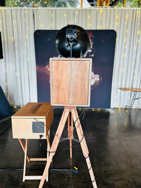 The retro photobooth beside a gold sequin backdrop in the marquee at Brahman Hills