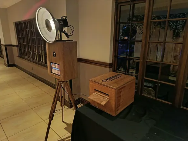 The retro photobooth and ring light set up beside the timber windows at Champagne Sports Resort