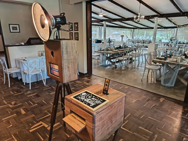 The photobooth set up beside the set tables in the open-sided venue at Collisheen
