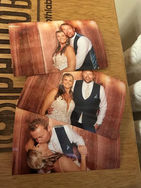 Postcard prints of the bride and groom laid out at a Granny Mouse wedding