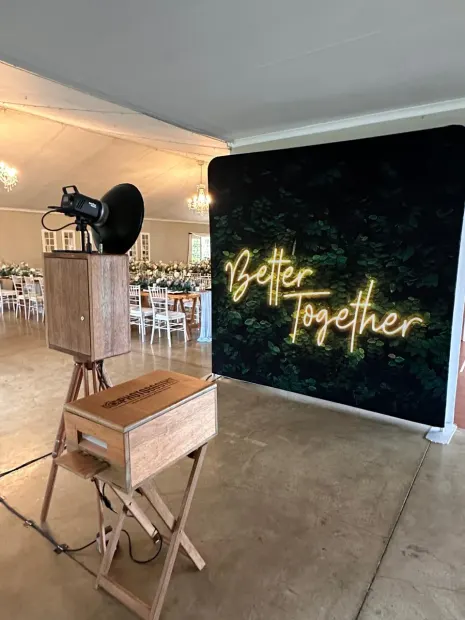 The photobooth beside the Better Together neon backdrop at Providence