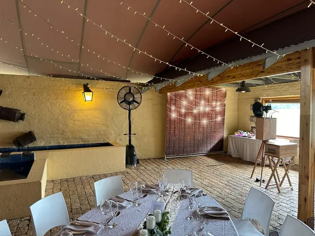 The photobooth set up on the covered patio at The Gallery, overlooking the farm