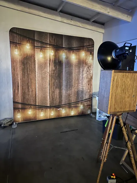 The retro photobooth and lit timber backdrop at The Groves, Caversham Valley