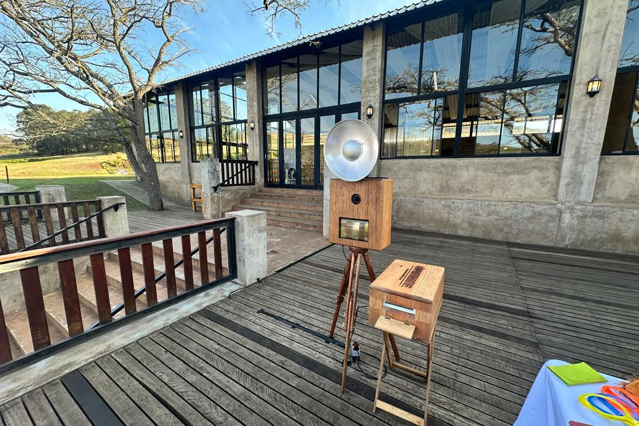 The retro photobooth on the timber deck outside the reception building at Wingrove Valley