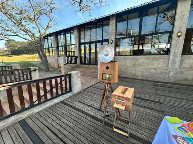 The retro photobooth on the timber deck outside the reception building at Wingrove Valley